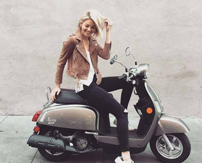 Amanda Pacheco poses with a scooter.